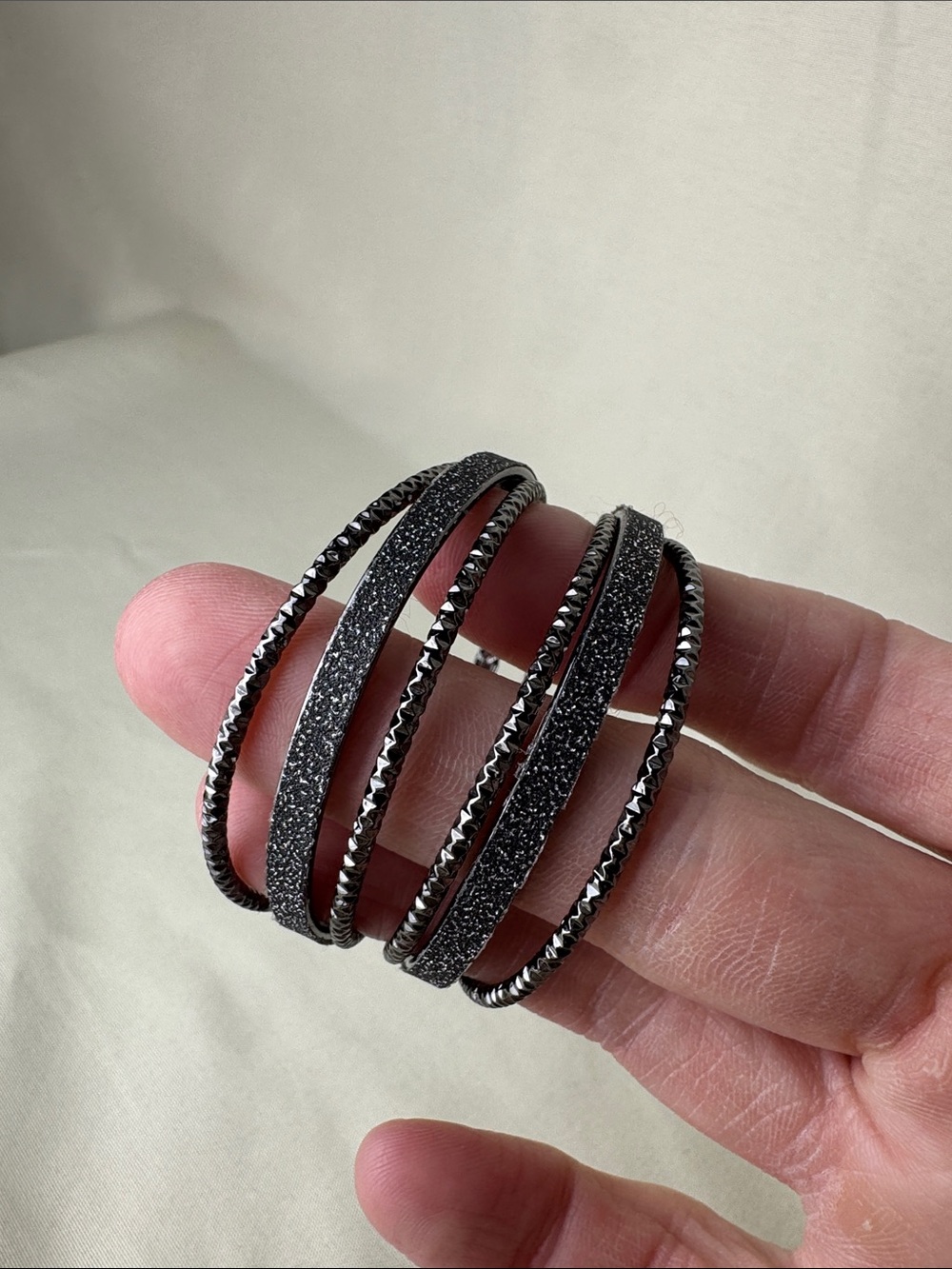 Bundle of Sparkly Multi-Tone Hoop Earrings in Gold, Silver, and Black - Picture 4 of 8